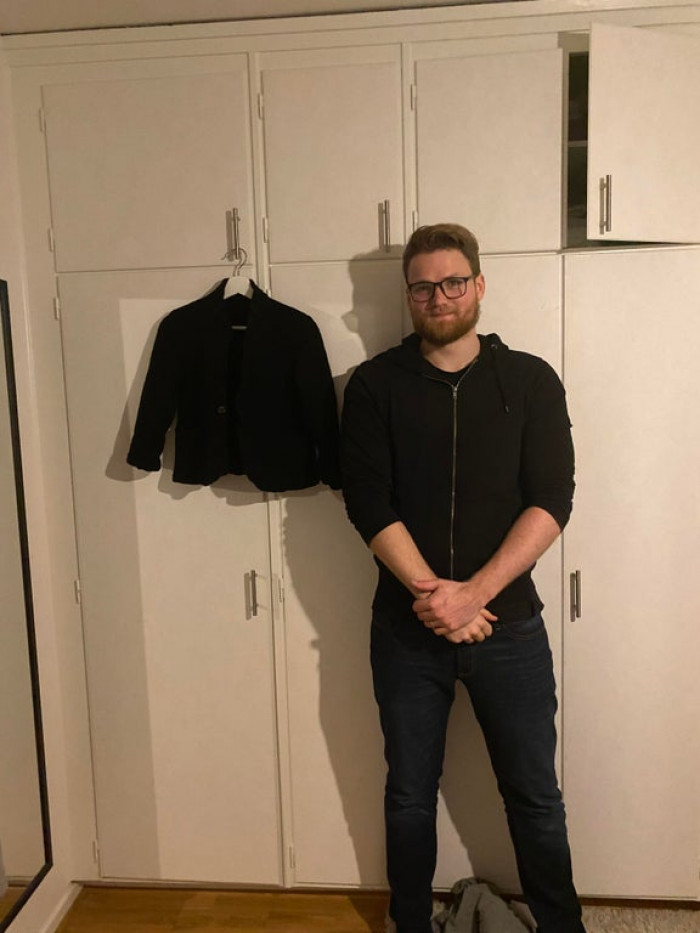 32. I’ve accidentally shrunk my husband's jacket. Husband for scale.