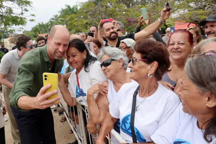 Prince William’s friendly selfie moment in Brazil sparks talk of shifting royal protocol.
