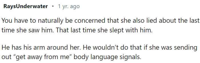 He has his arm around her...