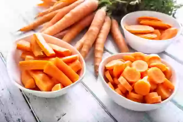 Eating about ten carrots daily for weeks can cause rare carotenemia, turning your skin orange.