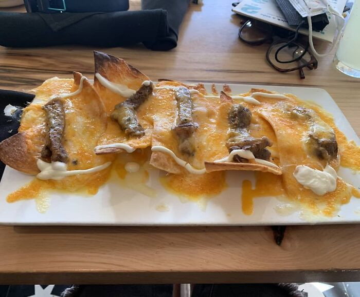 Someone please tell me what kind of fake nachos or whatever this is, because whoever made this needs to sit down somewhere.