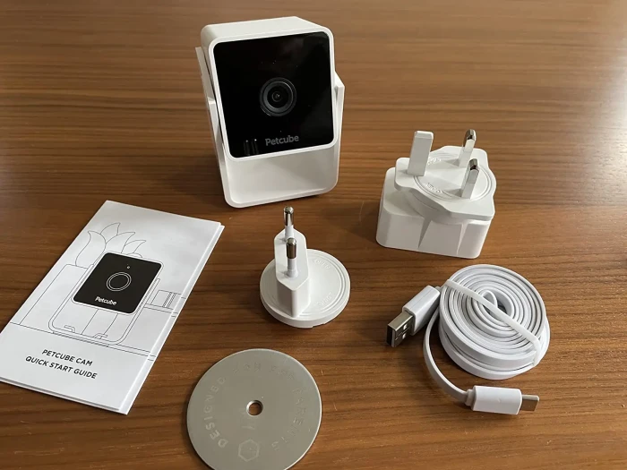 Pet owners viewing 360-degree camera feed during travel for monitoring.