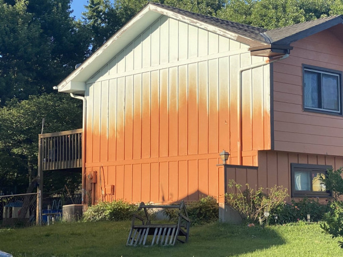 17. “A couple of years ago, my neighbor decided to paint his house bright orange... then gave up halfway through.”