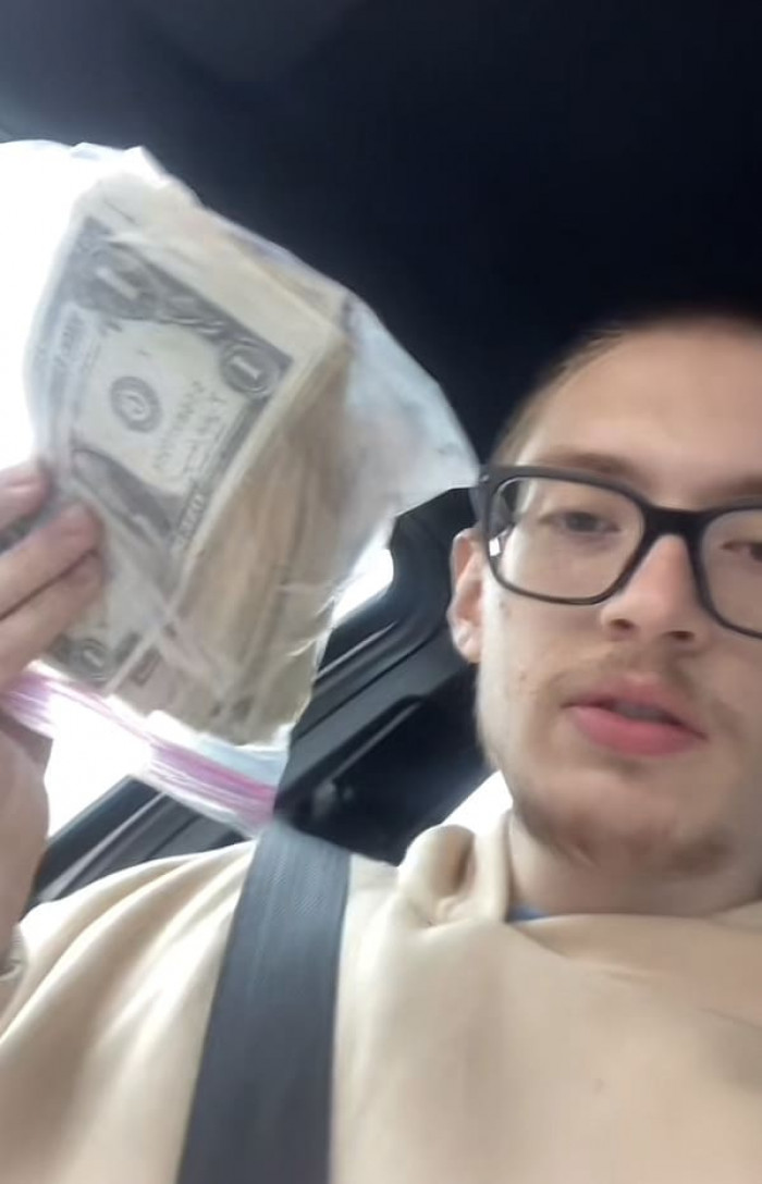 In the video, he can be seen going through the McDonald’s bag filled with money, which had been separated into smaller zip lock bags