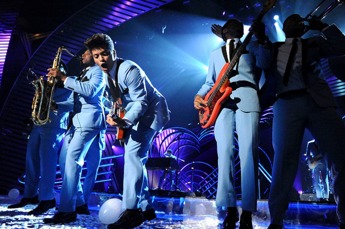 Bruno Mars fans cheering with romantic tour ticket promotions and new dates.