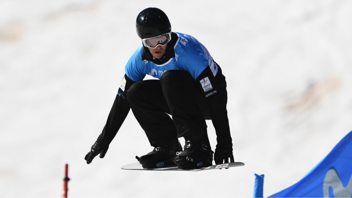 Olympic snowboarder in training gear after a neck injury accident