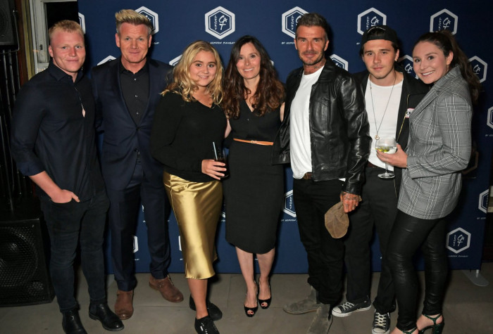 Brooklyn Beckham attending a public event, responding to family fame pressure.