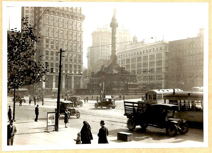 Original Public Square in downtown Cleveland, Ohio, seen in 1927, shows the city’s early skyline, streetcars, and the daily rhythm of life at the center of town.