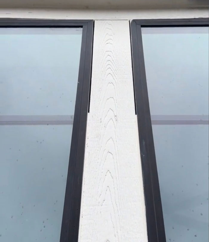 “Caulk that side, caulk that side, and then we got to the top, and, well, our ladder didn’t go that high, so we’re just going to stop.”