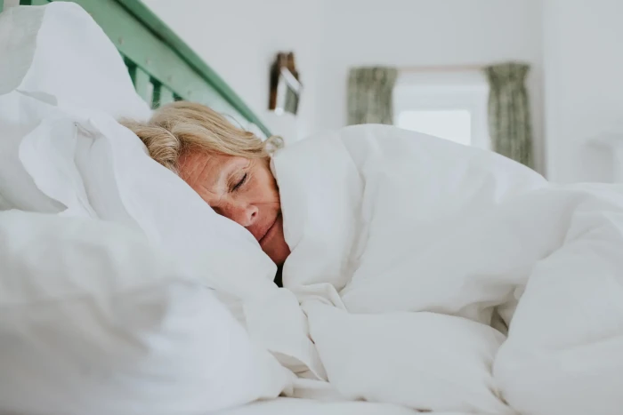 Doctor discusses sleep quality and quantity, emphasizing health benefits and well-being