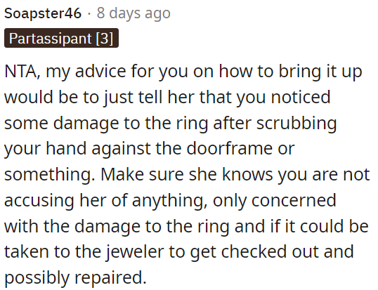 OP should simply tell her that she noticed damage to the ring while scrubbing her hand against the doorframe and express her concern about it.
