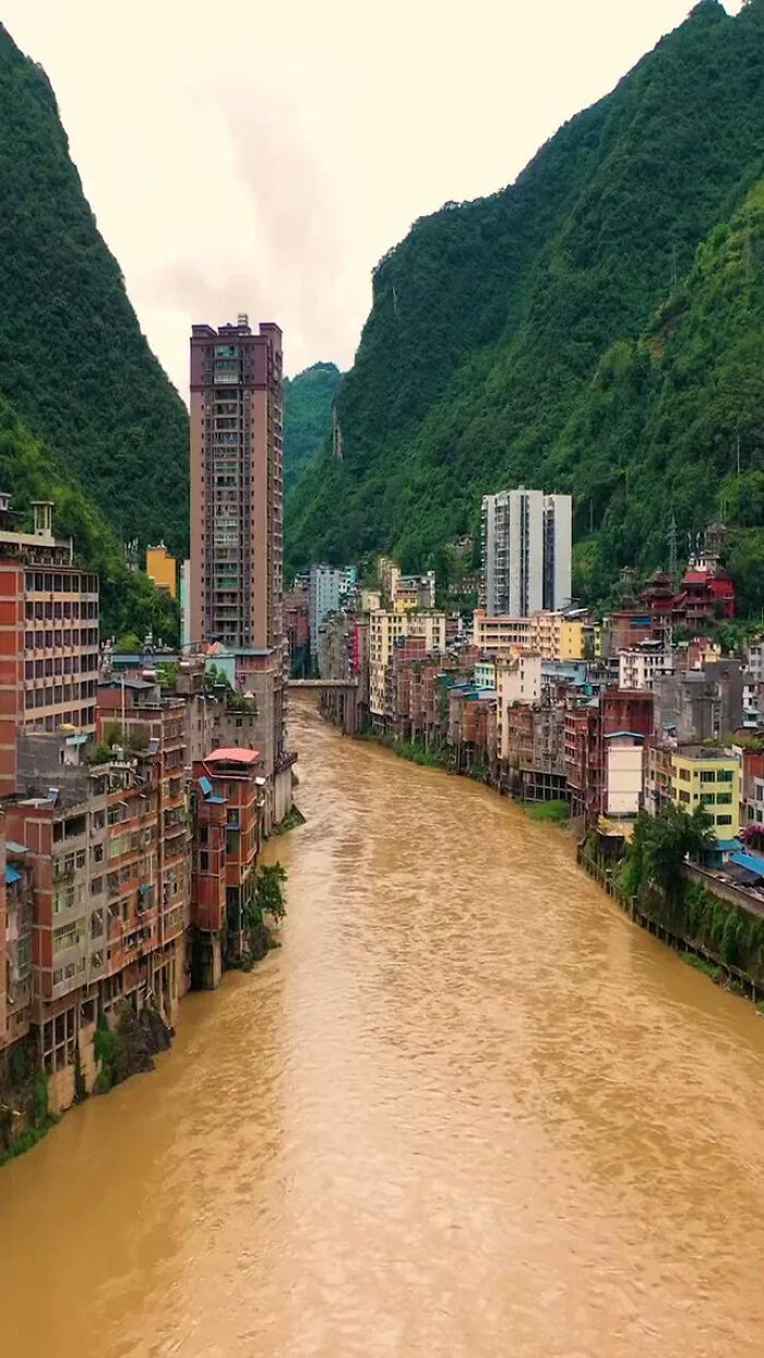 "Yanjin, The Narrowest City In The World. At Its Widest, The City Spans No More Than 300 Meters (1,000 Feet), With Some Sections Narrowing To Just 30 Meters (100 Feet). The Population Is About 500,000"