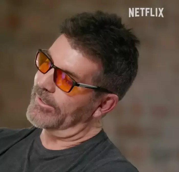 Why Simon Cowell wears orange glasses all the time has been questioned by fans and he has revealed why