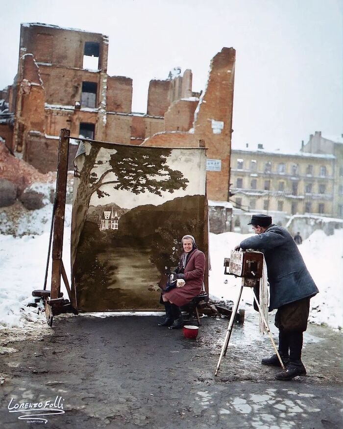 34. Photographer Michael Nash Using A Backdrop To Hide Buildings Damaged During World War II While Photographing A Woman In Warsaw, Poland In November 1946