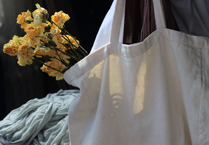 13. A long-lasting $50 tote bag featuring Tiffany's glasswork design proves to be a valuable and timeless investment