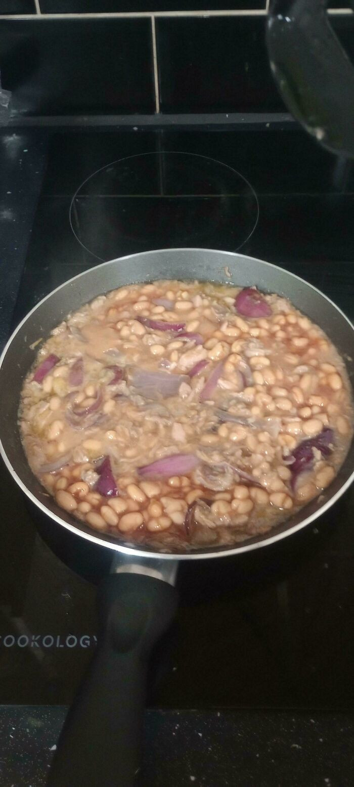 "Tuna With Baked Beans Fried In Butter With Red Onions And Garlic, A Filling For A Sandwich"