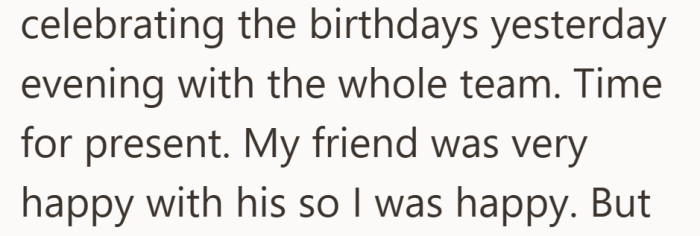 At the birthday celebration with the whole team, her friend opened his present and seemed genuinely happy.