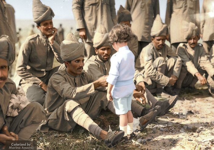 "French Boy Introduces Himself To Indian Soldiers Who Had Just Arrived In France To Fight Alongside French And British Forces, Marseilles, 30th September 1914"