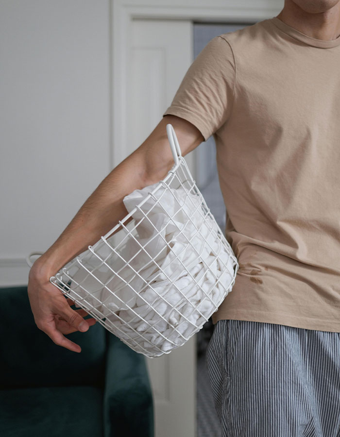 Laundry day, but not for you—this intruder took it upon himself to hang up the clothes before disappearing.