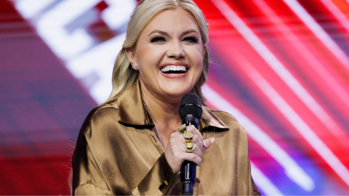 Erika Kirk posing during an interview, discussing Turning Point USA and faith