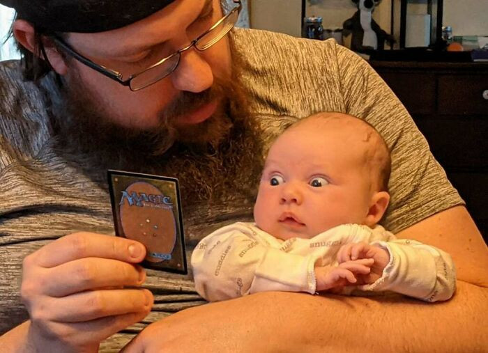 "Had A Big Chuckle At This Photo My Wife Snapped Of Our 3.5-Week-Old Daughter And Me During Our Match. How Are You Enjoying Building A Nerd?"