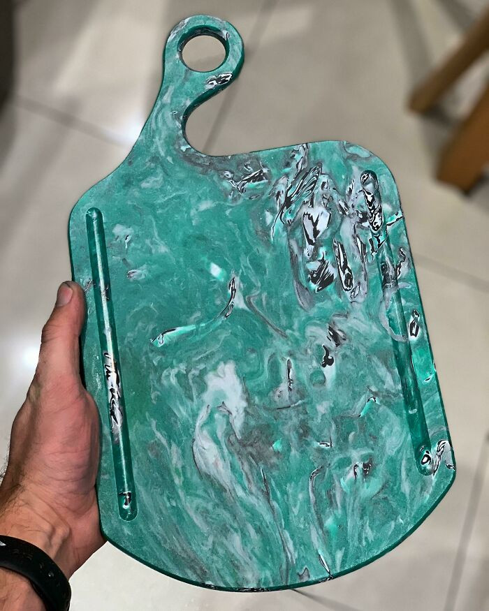 "A Charcuterie Board Made From 100% Recycled Plastic Bottle Caps"