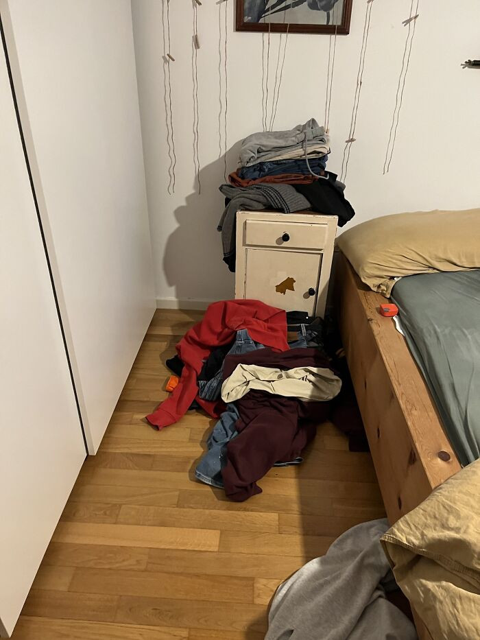 Laundry basket filled with clean clothes, too much to fold upstairs