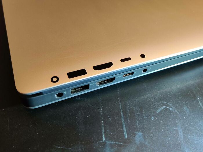 "Got Sick Of Fumbling Around Whenever Plugging In Power, USB, Etc. So I Made Port Labels For My Laptop"