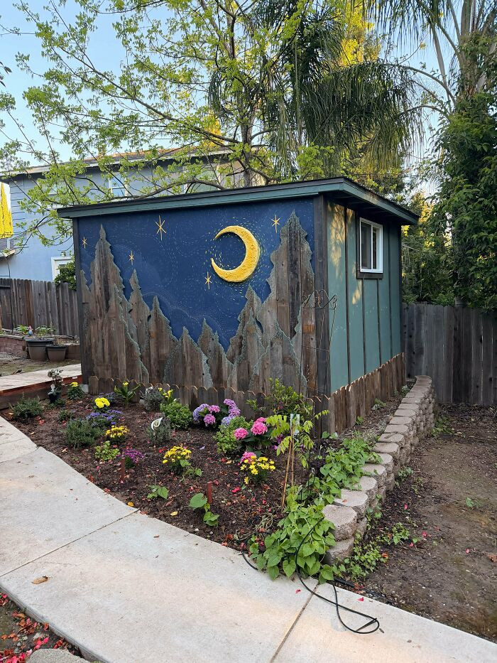 "I Decorated The Side Of My New Shed With Trees Made From Old Fence Boards"