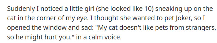 Sipping her coffee, she spotted a young girl approaching her cat Joker. With a calm warning, she saved the day, telling the girl, 