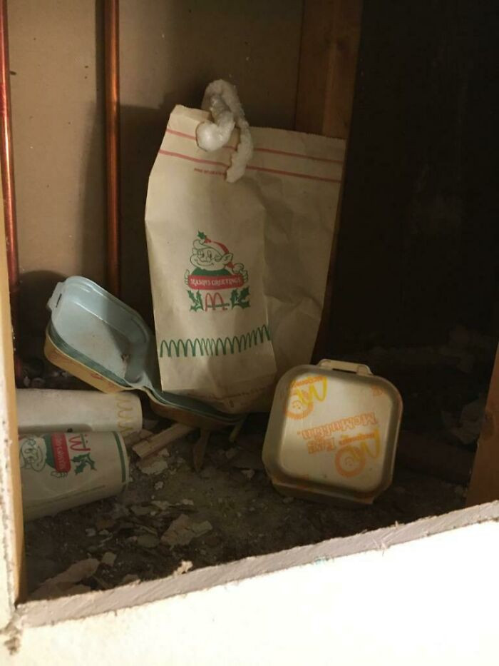 15. Trash from McDonald's Christmas pack from 1977 has been perfectly preserved in those walls