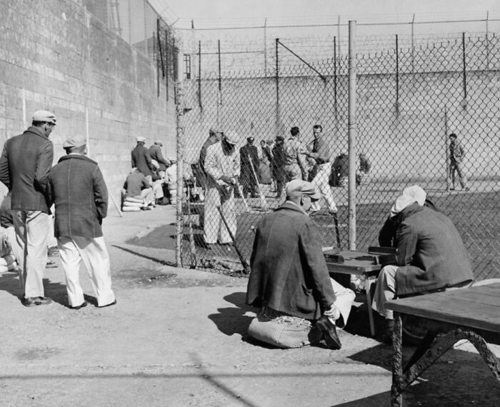 Alcatraz Inmates Play Dominoes And Baseball In The Recreation Yard