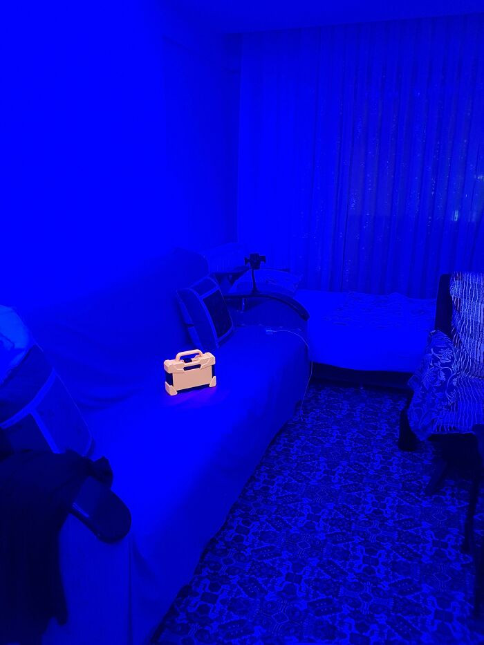 "My Orange Toolbox Looks Like A Real Life Pickup Item Under My Room's Blue Light"