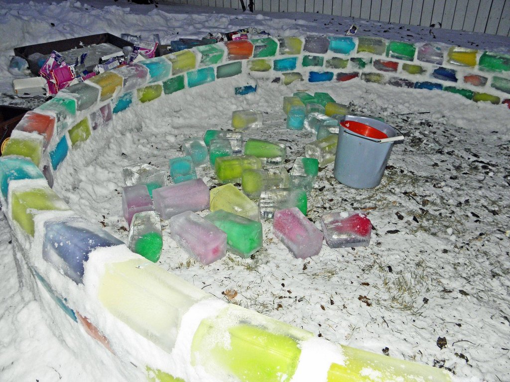 The preparation phase saw the utilization of numerous milk cartons, each dyed with vibrant hues, setting the stage for the colorful spectacle to come.