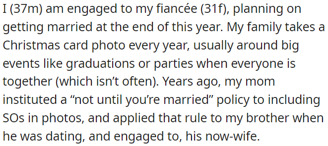 OP is engaged, and their family only includes their spouse in their annual Christmas card photos once they are married.