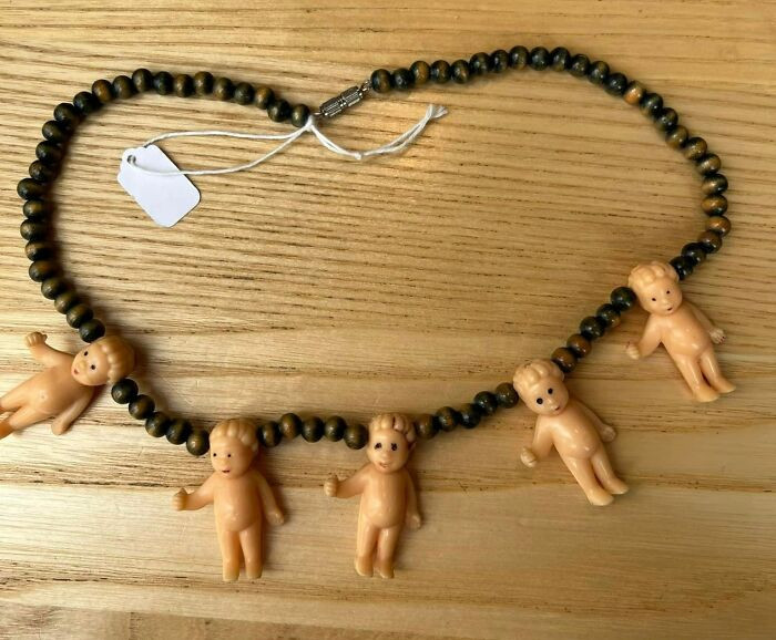 15. Perfect gift for someone. Not sure who. But someone will appreciate a necklace of tiny plastic babies.