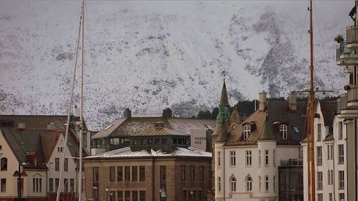 "A Natural Rock Formation On A Mountainside Near Alesund, Norway"