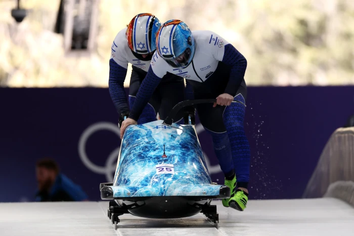 Israeli bobsleigh team members in winter gear amid Olympic disqualification fallout