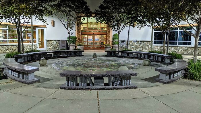 Our Local Library Has Books For Bench Legs, And They're Titled As Famous Novels