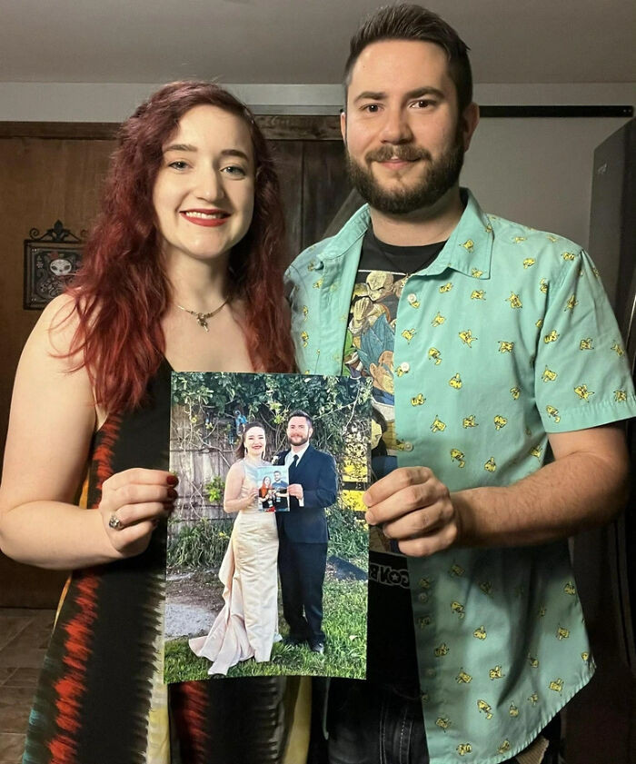 "My Wife And I Take A Picture On Our Anniversary Holding Last Year's Photo. Seven Years Married Today"