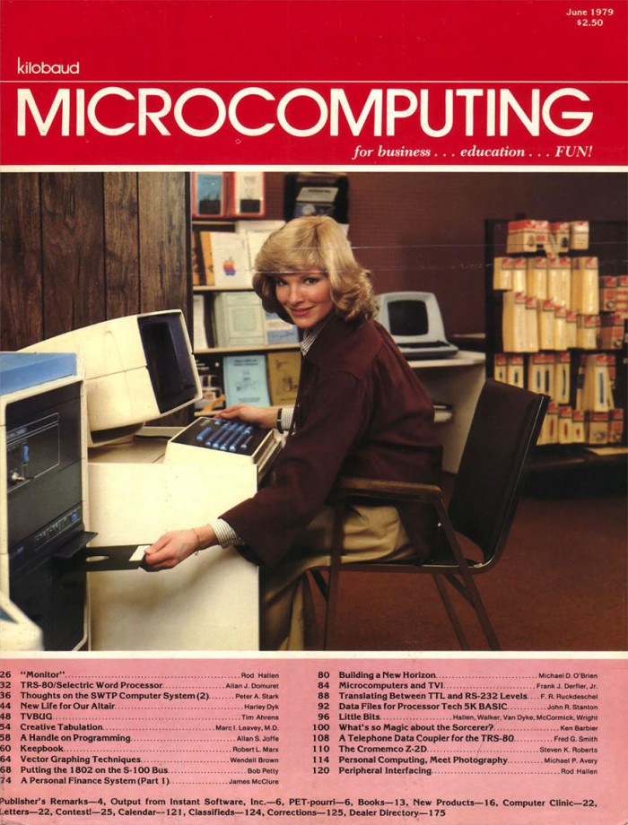 7. She looks so happy to be using her computer; little did they know that these full setups wouldn't be needed for long.