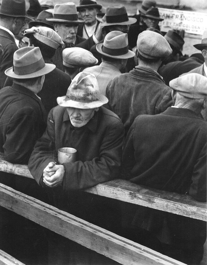 White Angel Breadline, San Francisco, 1932. A stark look at Depression-era hardship, capturing people waiting in line for a basic meal during one of America’s toughest moments.
