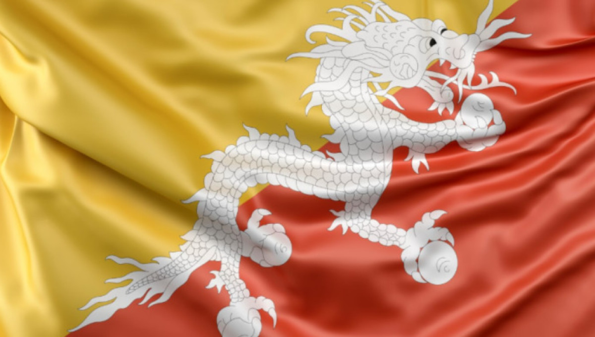 12 of the Weirdest Country Flags in the World, From AK-47s to a Dragon Holding Jewels