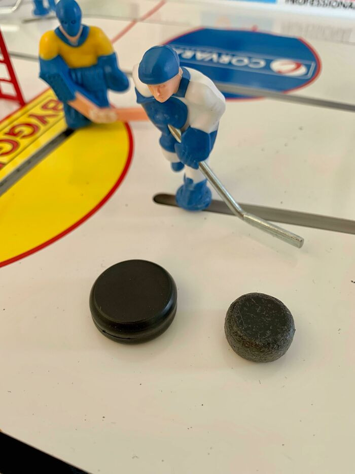 "Table Hockey Puck After About Four And A Half Years Of Playing. New One On The Left For Comparison"