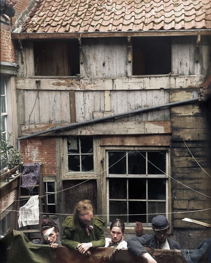 44. Four Women Photographed Outside A House In The Slums Of Amsterdam, The Netherlands In 1899.