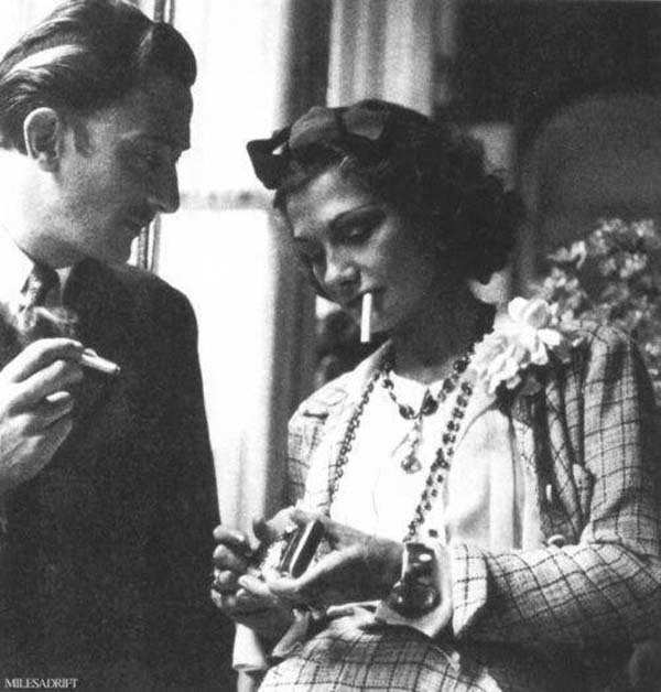 6. Salvador Dali and Coco Chanel sharing a smoke break (1938).