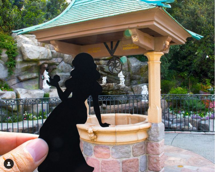 4. Snow White at her wishing well in Disneyland