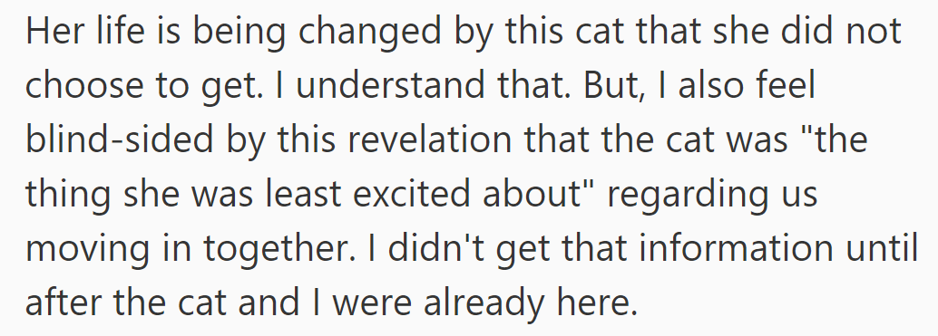 She feels her life has been altered by a cat she didn't choose, which blindsided him post-move-in.
