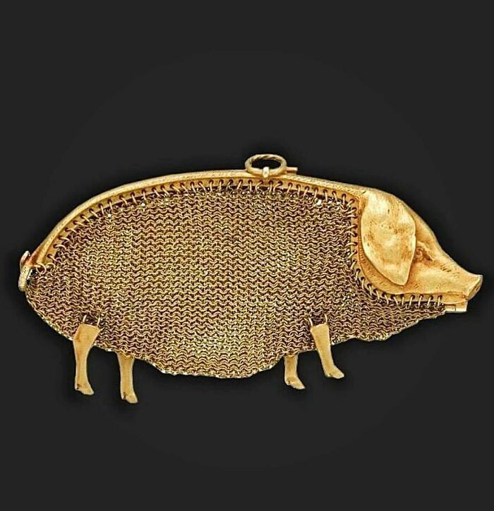 28. Antique pig-shaped mesh purse - unique and charming.