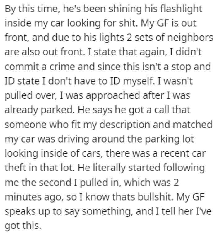 The cop was shining the light in OP's car, trying to find anything illegal